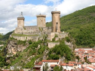 gray concrete castle on top of hill
